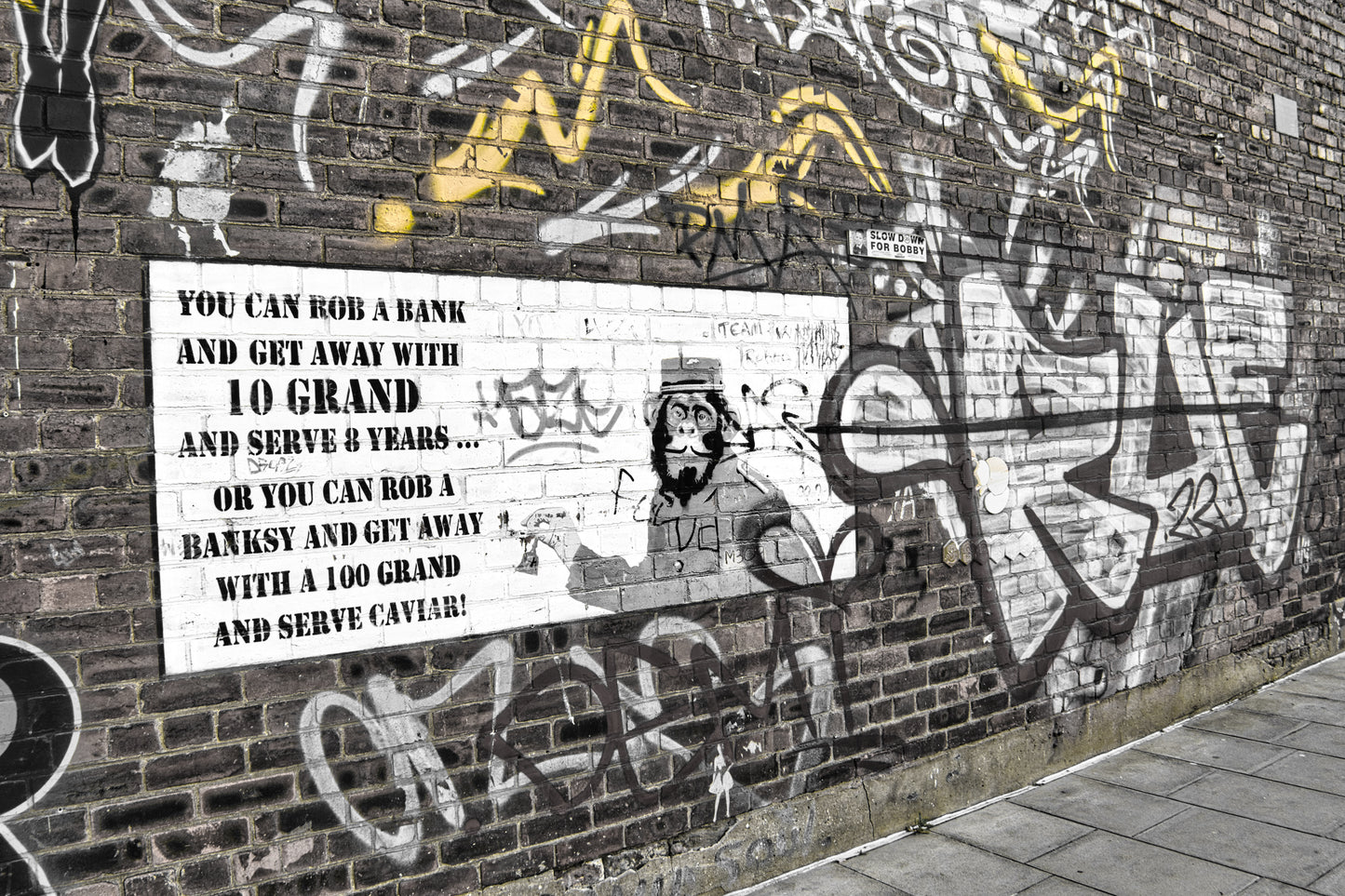 Liverpool Baltic Triangle Photo and Images -Liverpool Graffiti - Banksy 10 Grand - PTI07294 - Photo by Photographer Martin Fisher - Picture The Image